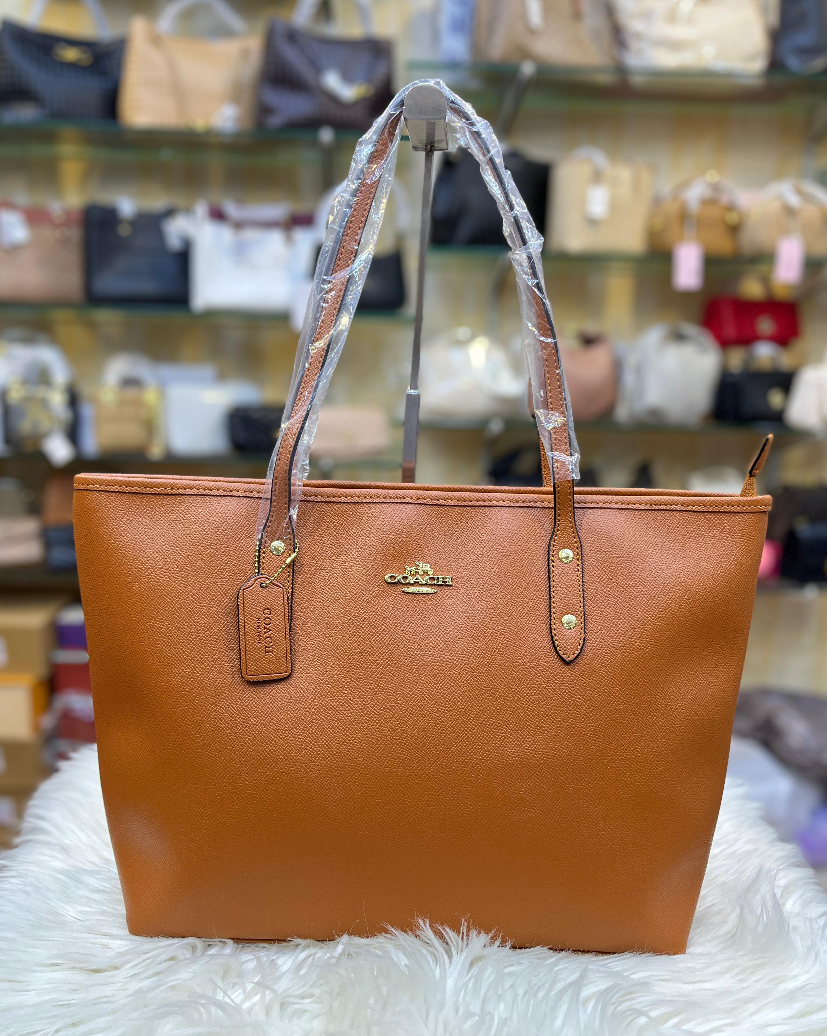 COACH City Tote Bag In Signature Canvas - Light Saddle