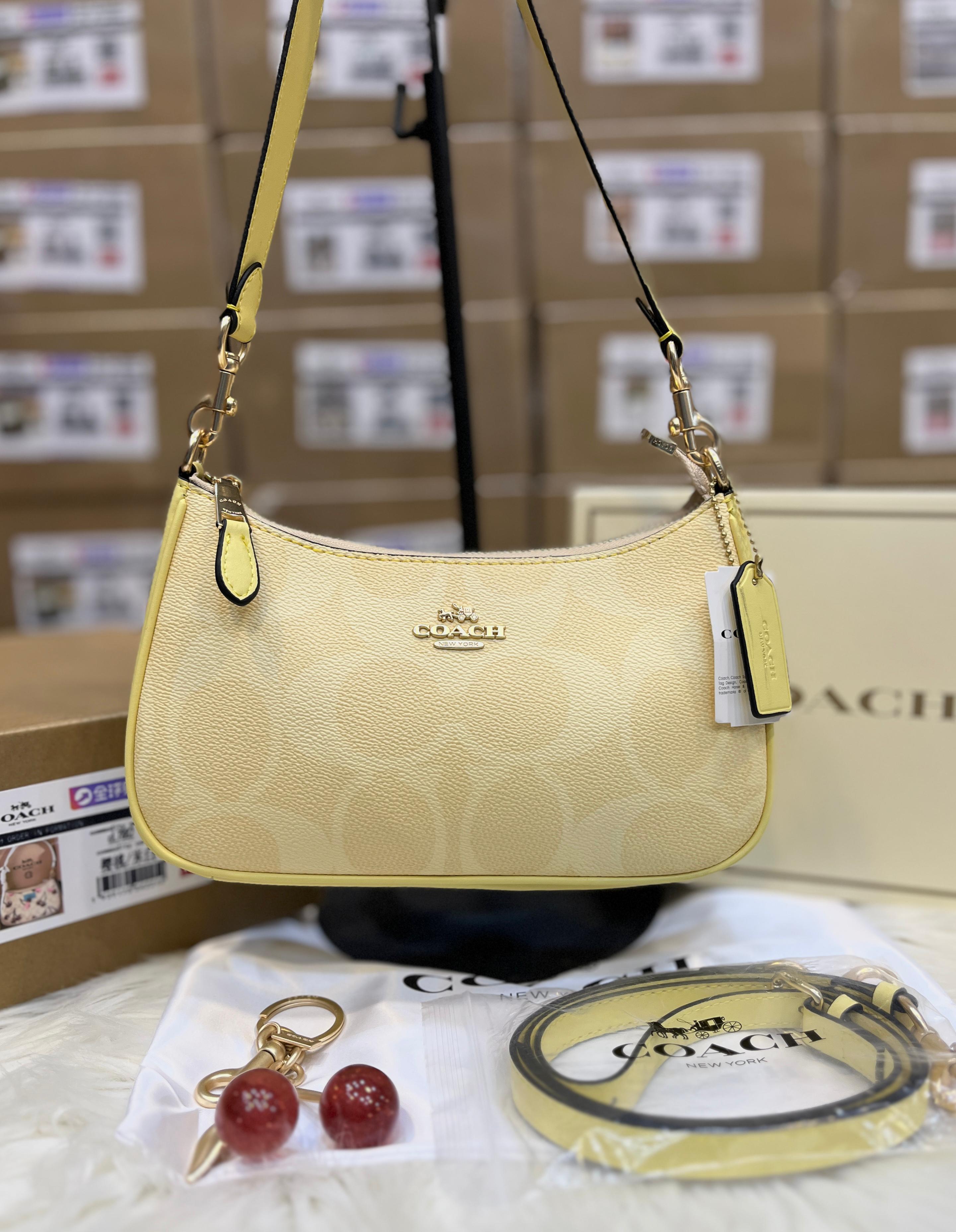 COACH Teri Shoulder Bag In Signature Canvas - Yellow