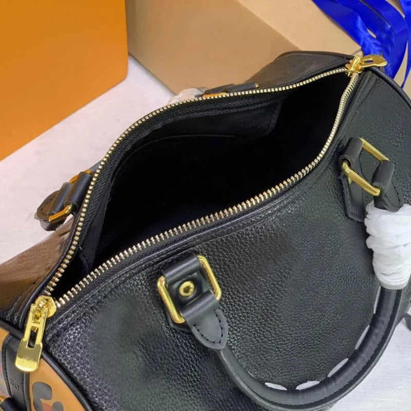 LOUIS VUITTON Wild At Heart Speedy Bandouliere Duffle